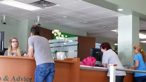 Motion of customer asking question about opening bank account Stock Footage 90070272