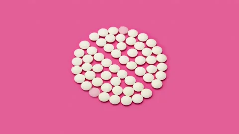 Motion design. 4K Stop motion animation of white pill on Pacific Pink background Stock Footage 168537434