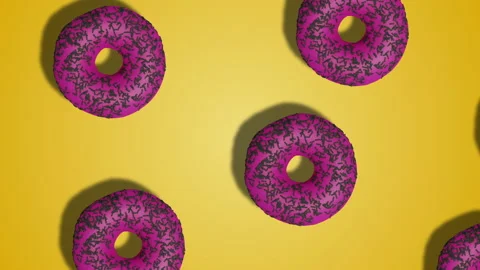 Motion design diagonal pattern of glazed donuts on yellow abstract background Stock Footage 196481657