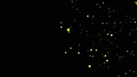 Motion design yellow particles move smoothly over a black background. Motion Stock Footage 229494633