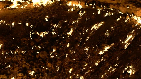 Motion detail of Gate of Hell / Darwaza crater on fire by night, 4K, DNxHR Stock Footage 150389133