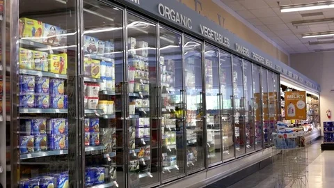 Motion of display ice cream corridor in shopper drug mart store Stock Footage 78111881