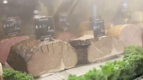 Motion of display roast beef with spray steam water Stock Footage 71214757