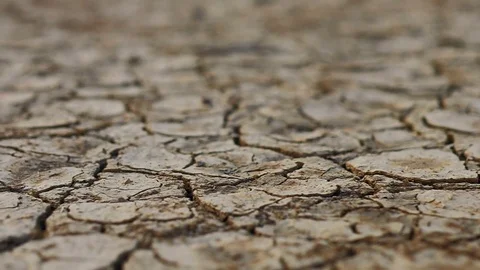 Motion of Dry Lake or River making Cracked Clay on Ground. Earth Day Concept. Stock Footage 111468289