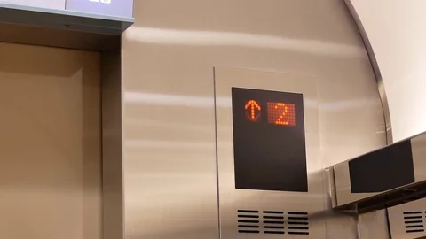 Motion of elevator digital display main to eight floor inside mall Stock Footage 82671595