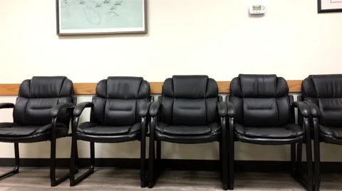 Motion of empty chair for patient waiting place inside BC medicial office Stockbeeldmateriaal 66435686