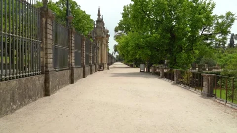 A motion footage of a long, straight path in a historic park with an ornate.. Stock Footage 337622096