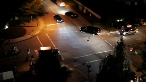 Motion of four way traffic intersection traffic flow Stock Footage 77531601