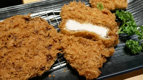 Motion of fried chicken on table inside ... | Stock Video | Pond5