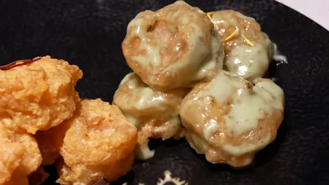 Motion of fried shrimp with sauce on table inside Chinese restaurant 스톡 동영상 99023439