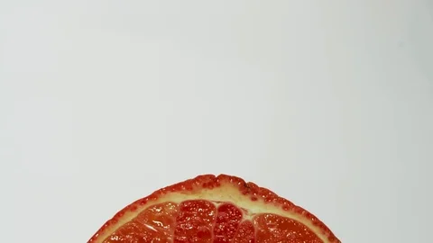 Motion. grapefruit fresh sliced half Stock Footage 103428728