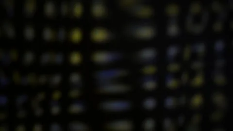 Motion Graphic of Abstract Yellow and Blue Bokeh Lights on a Dark Digital Gri Stock Footage 344722155