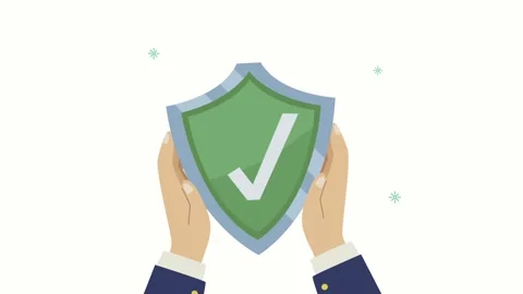 A motion graphic of hands holding a green shield with a checkmark symbol, r.. Stock Footage 334540397