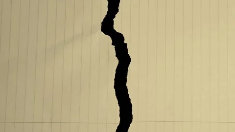 Motion graphic of a single crumpled sheet of paper on a black background.  Stock-Footage 293608726