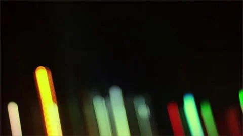 Motion graphic:backdrop light stripes on a black background. Video stock 296860472