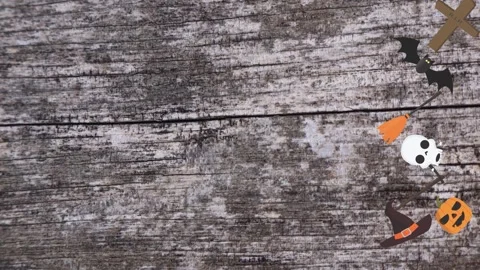 Motion graphics with Halloween elements designs on the wood texture screen 库存影片 285699194