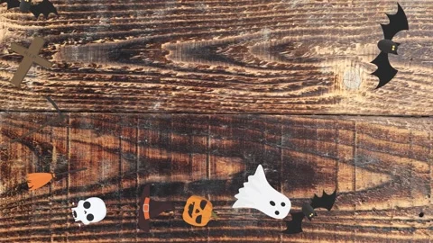 Motion graphics with Halloween elements designs on the wood texture screen Stock Footage 285699255