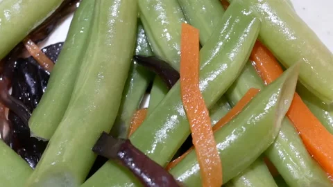 Motion of green bean on table inside Chinese restaurant with 4k resolution. Video stock 98796931