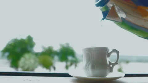 Motion hand of men using spoon to mix the coffee in the white cup. Stock Footage 156382476