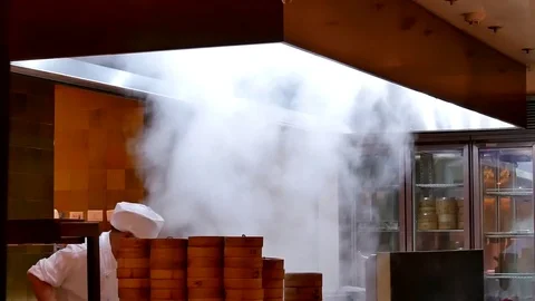 Motion of heavy steam dim sum inside bamboo steamer basket with 4k resolution. Stock Footage 84178359