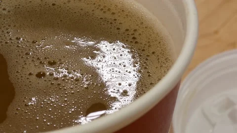 Motion of hot coffee on table at food court inside shopping mall Stock Footage 167318737