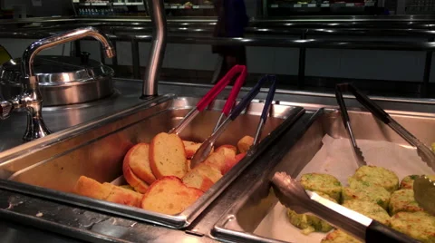 Motion of hot garlic bread with smoke at food court area inside Ikea store Stock Footage 67652077