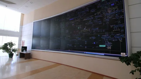 Motion to huge screen with data on wall in control office Vidéo 154289525