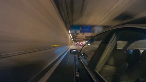 Motion hyper-lapse car driving in tunnel Paris skyline view at night Video stock 171023422