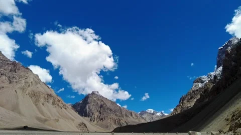 Motion lapse of Beautiful cluds on sunset or sunrise over the mountain Stock Footage 194771908