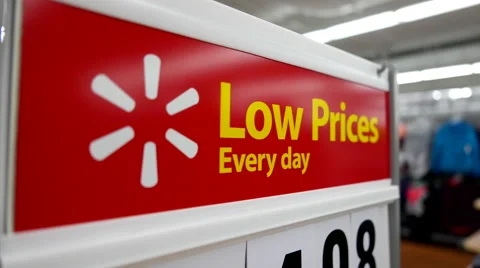 Motion of low prices every day sign on woman clothes section Video stock 66579511