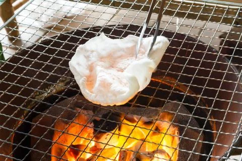 Motion of making Thai rice crispy. Stock Photos