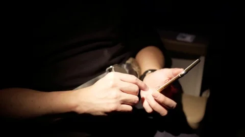 Motion of man browsing website on smart phone while traveling Stock Footage 84835821