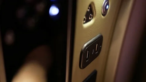 Motion of man inserting USB cable for charging his smart phone Stock Footage 88315730