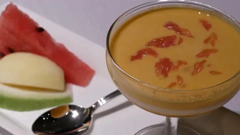 Motion of mango pudding dessert and fruit inside Shang Palace restaurant Video stock 99024748