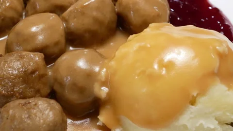 Motion of meatball meal on table inside Ikea store with 4k resolution Stock Footage 97720934