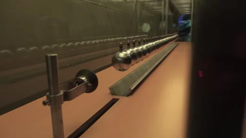 Motion metal balls experiment science museum CosmoCaixa Barcelona Stock Footage 327207108