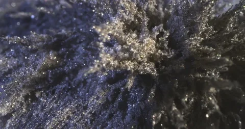 Motion Metallic Powder Under the Influence of a Magnetic Field. Stock Footage 136499034