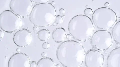 Motion of molecule bubbles in a cosmetic serum, macro. Transparent cosmetic.. Stock Footage 269024656