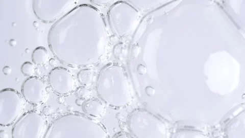 Motion of molecule bubbles in a cosmetic serum, macro. Transparent cosmetic.. Stock Footage 271131292
