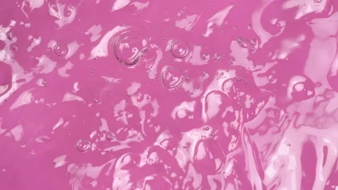 Motion of molecule bubbles in a cosmetic serum, macro. Transparent cosmetic.. Stock Footage 274557604