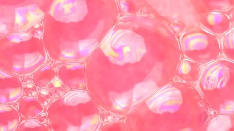 Motion of molecule bubbles in a cosmetic serum on a pink background, macro. Stock Footage 293736538