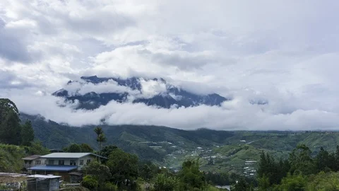 Motion moving cloud time-lapse with Mount Kinabalu Stock Footage 92120869