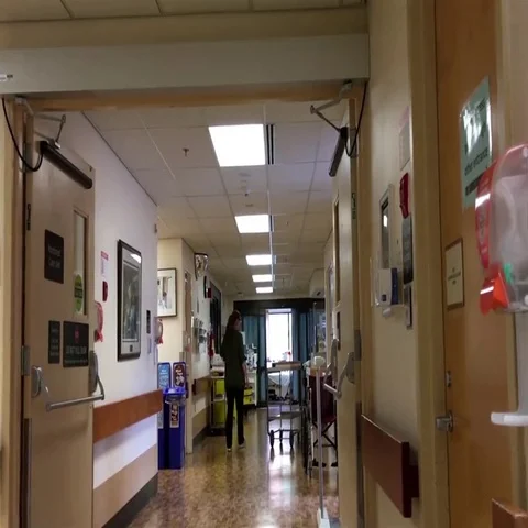 Motion of nurse working at monitored care unit inside Eagle Ridge hospital Video stock 69629258