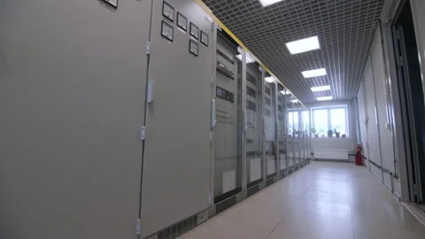 Motion past closed cabinets with switchboards at substation Video stock 154288530