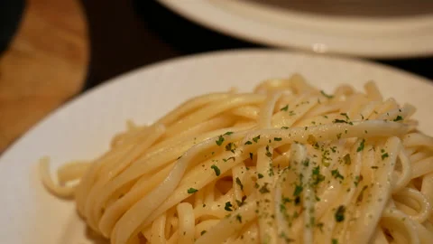 The motion of pasta on a table inside a Chinese restaurant Video stock 203445702