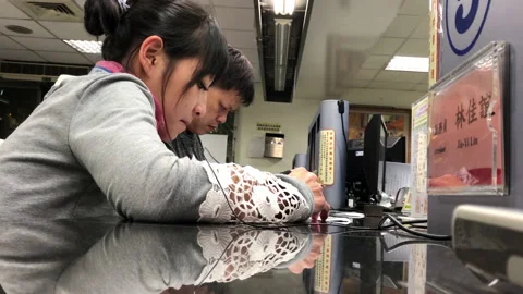 Motion of people applying id inside household registration office Video stock 104074467