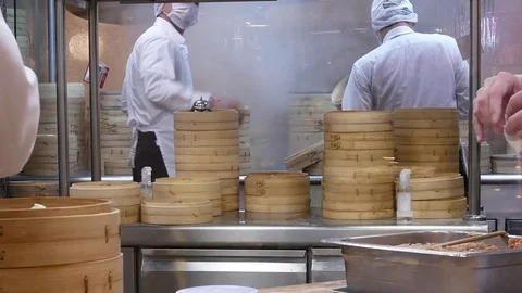 Motion of people are shaping the dough with their hands to make dumplings Stock Footage 83359555