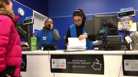 Motion of people asking about lost item and worker checking lost log Video stock 83719595