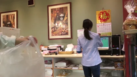 The motion of people buying bread inside Maxim's bakery with 4k resolution Video stock 232689324