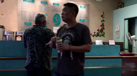Motion of people buying drinks at food court area inside mall Stock Footage 67522853